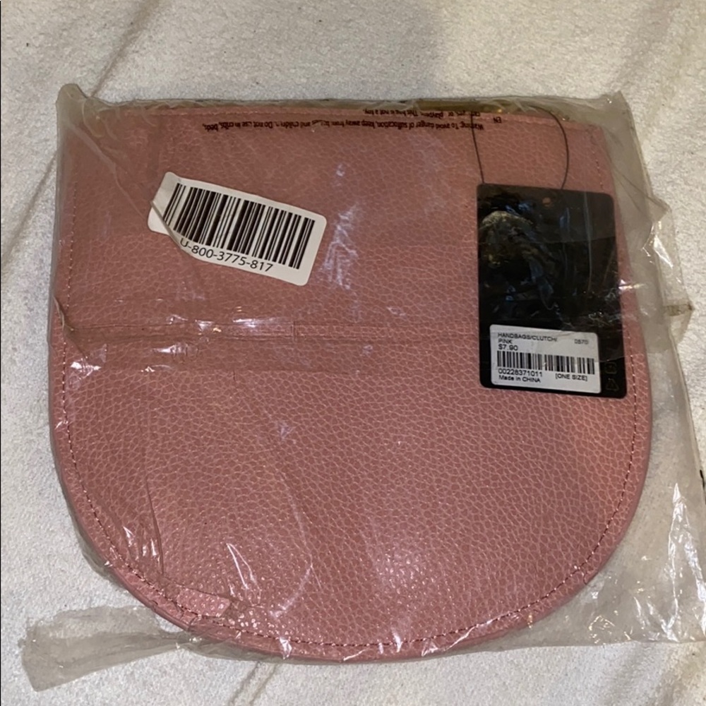 Pink hand clutch bag